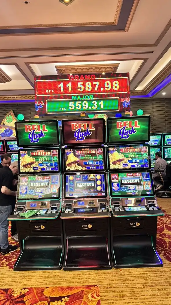 Overhead jackpot LED display above slot bank