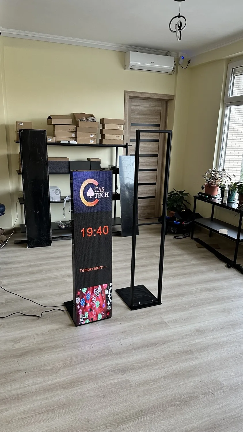 Custom digital information LED pillar displaying time